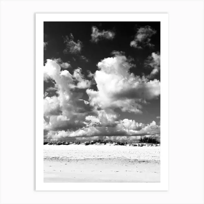 Black And White Clouds over Beach Art Print by Kickstand