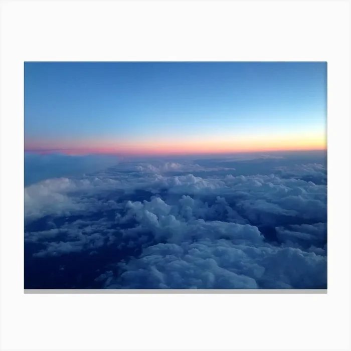 产品名称中包含顶级域名,检查并适当处理后再继续! Over the clouds Canvas PrintI by InstaJulio.fr