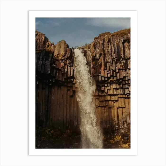 Icelandic Waterfall In Orange Sunset Art Print by Kin