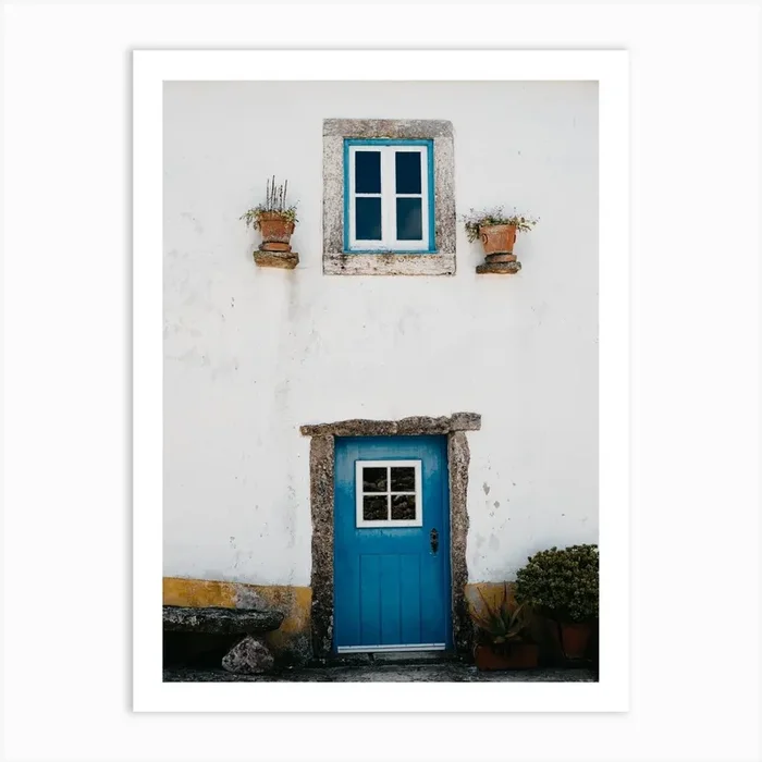 The Tiny Blue Door In A Village In Portugal Art Print by Aimee Giles